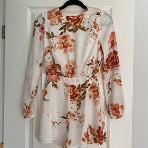 Never worn open back romper!